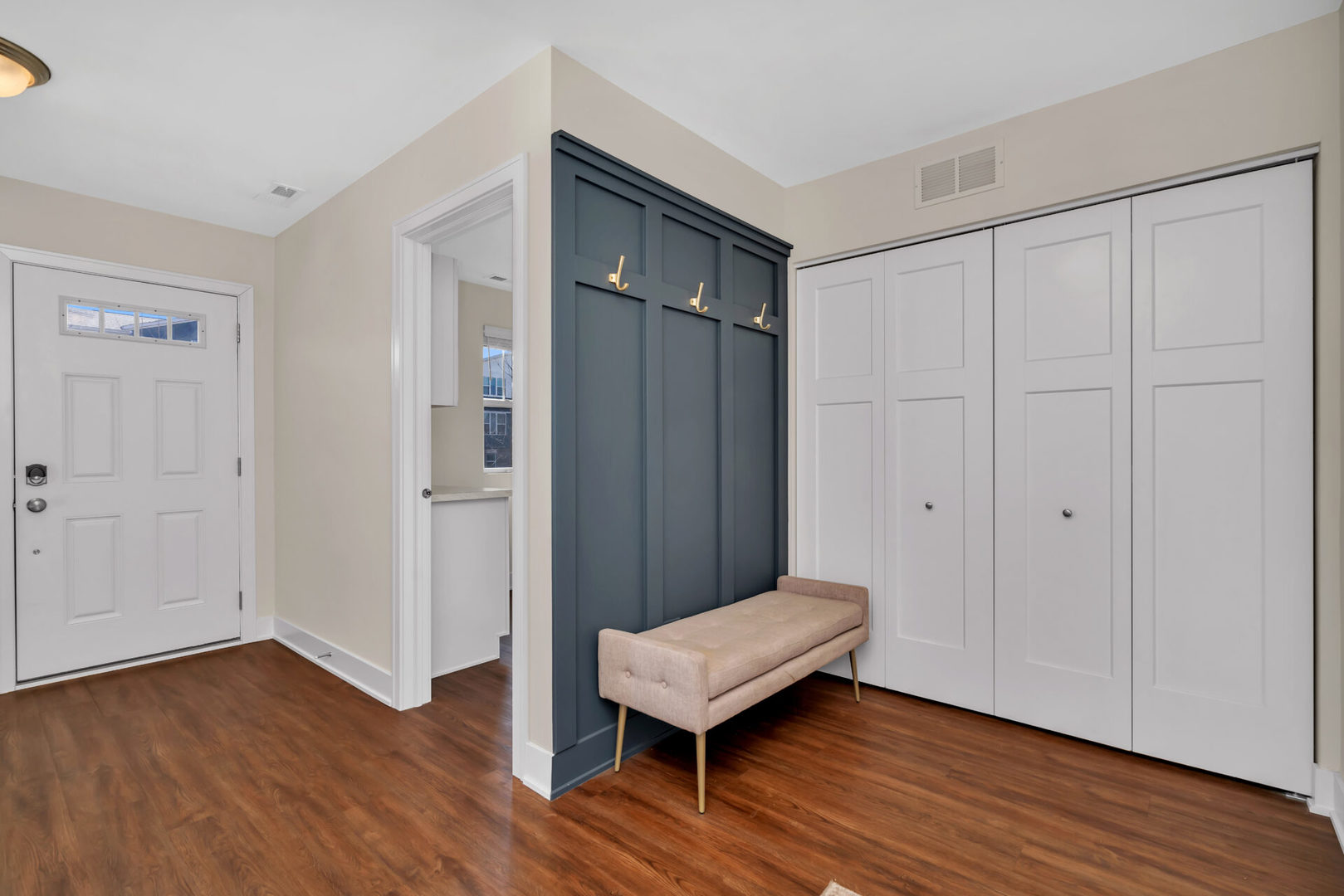 4133 Calder Lane Aurora, IL 60504 - Photo 4 of 31 a view of a hallway with wooden floor