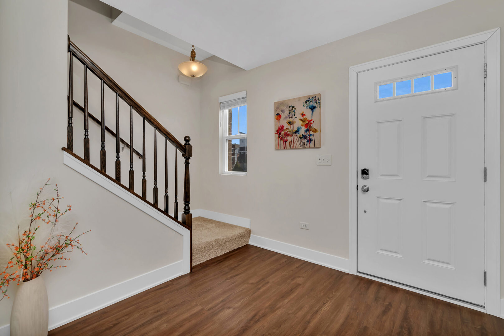 4133 Calder Lane Aurora, IL 60504 - Photo 6 of 31 a view of entryway with stairs and wooden floor