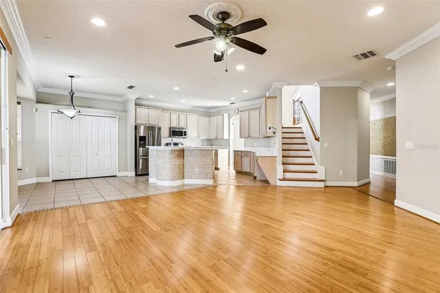 a kitchen with a sink a stove and refrigerator