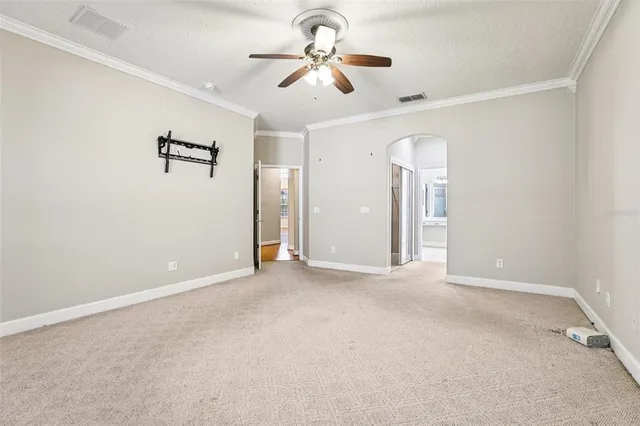 a spacious bathroom with a double vanity sink a mirror and a bathtub