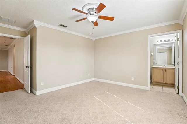 a bathroom with a sink mirror and shower