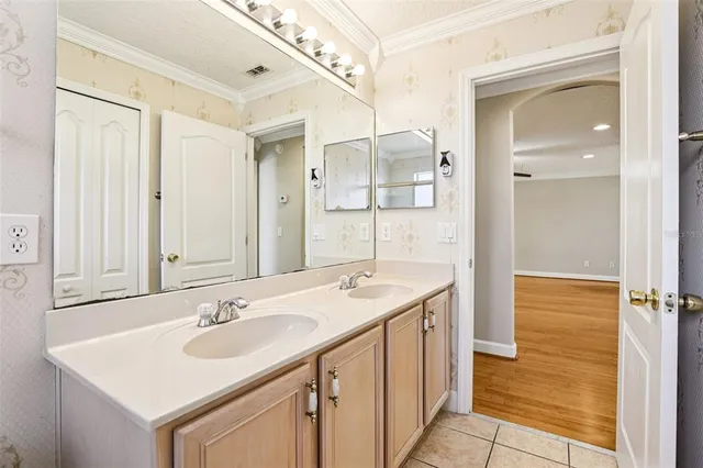 a view of a livingroom with a ceiling fan and window