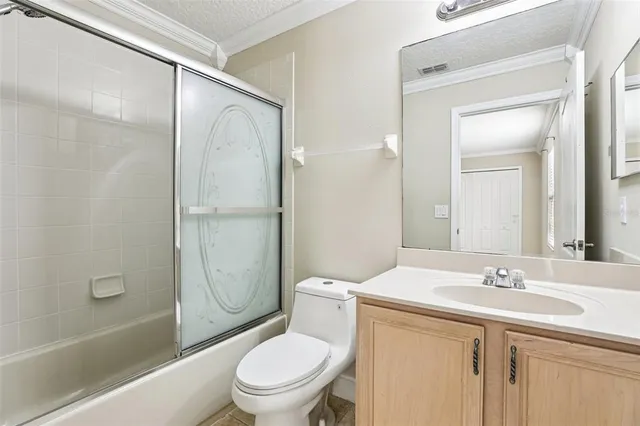 a view of empty room with floor to ceiling window