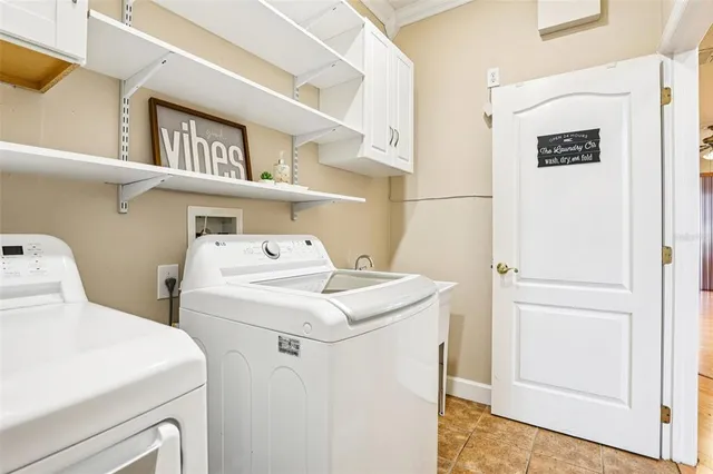 a view of a backyard with sitting area