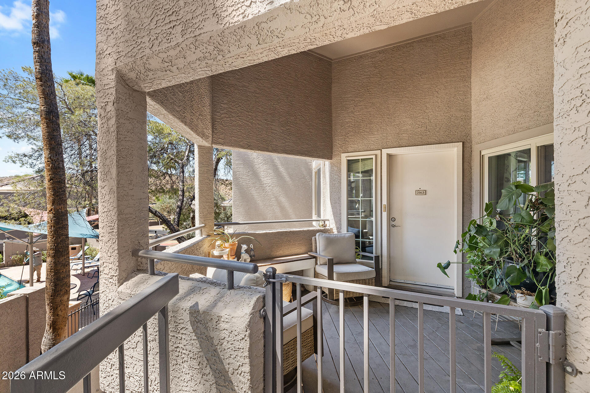 1720 East Thunderbird Road, Unit 2063 Phoenix, AZ 85022 - Photo 12 of 32 a view of balcony with chairs
