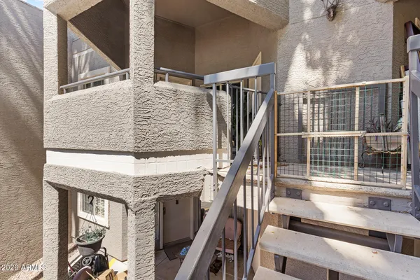 a view of balcony with chairs