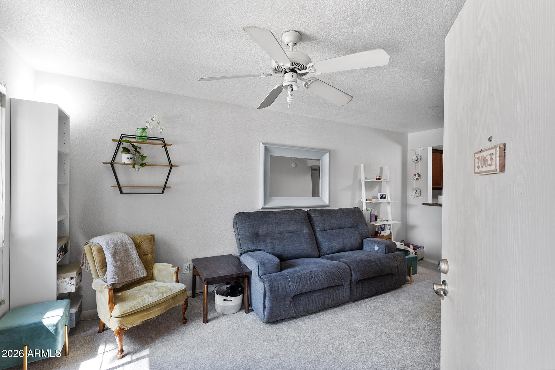1720 East Thunderbird Road, Unit 2063 Phoenix, AZ 85022 - Photo 15 of 32 a living room with furniture