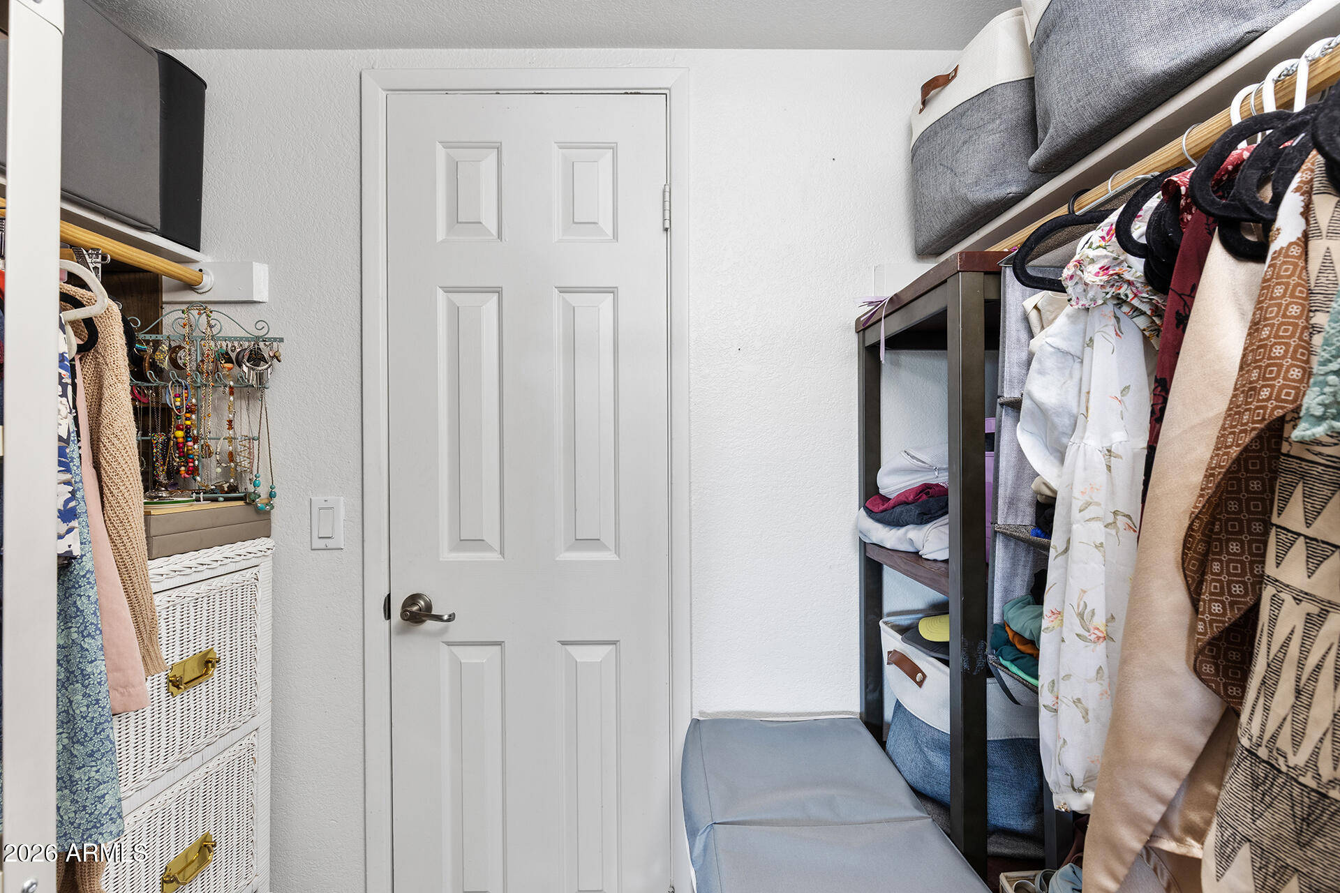 1720 East Thunderbird Road, Unit 2063 Phoenix, AZ 85022 - Photo 24 of 32 a view of walk in closet with clothes and shoes