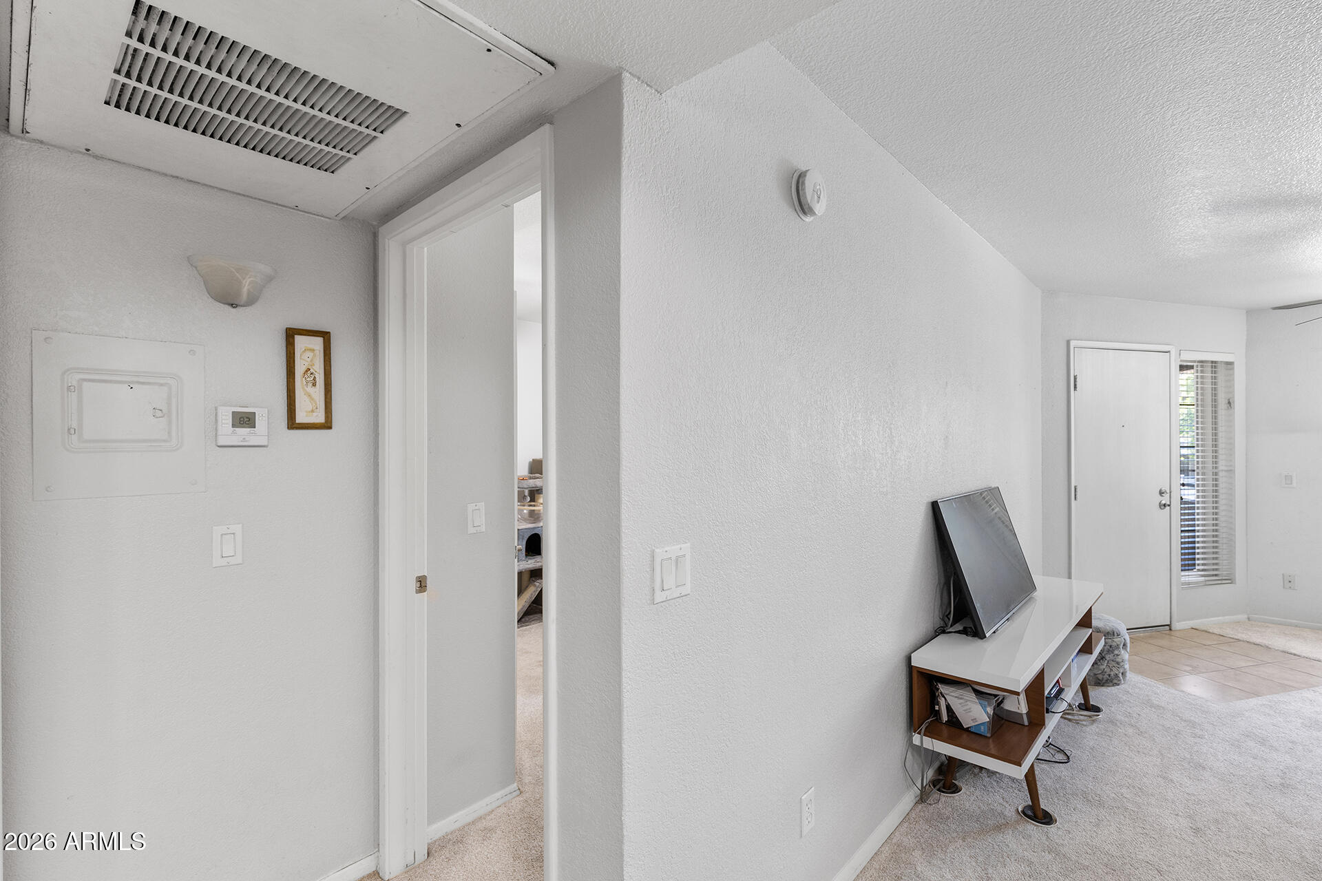 1720 East Thunderbird Road, Unit 2063 Phoenix, AZ 85022 - Photo 28 of 32 a living room with furniture