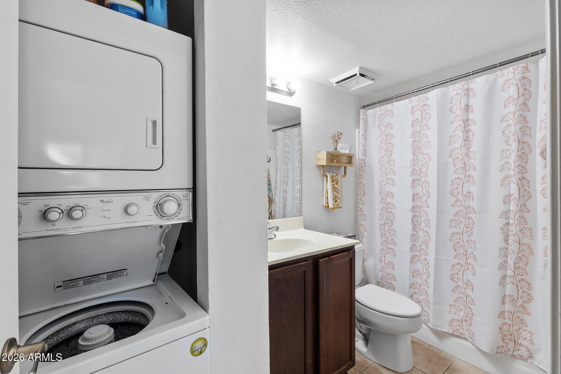 1720 East Thunderbird Road, Unit 2063 Phoenix, AZ 85022 - Photo 29 of 32 a bathroom with a sink a toilet and a mirror