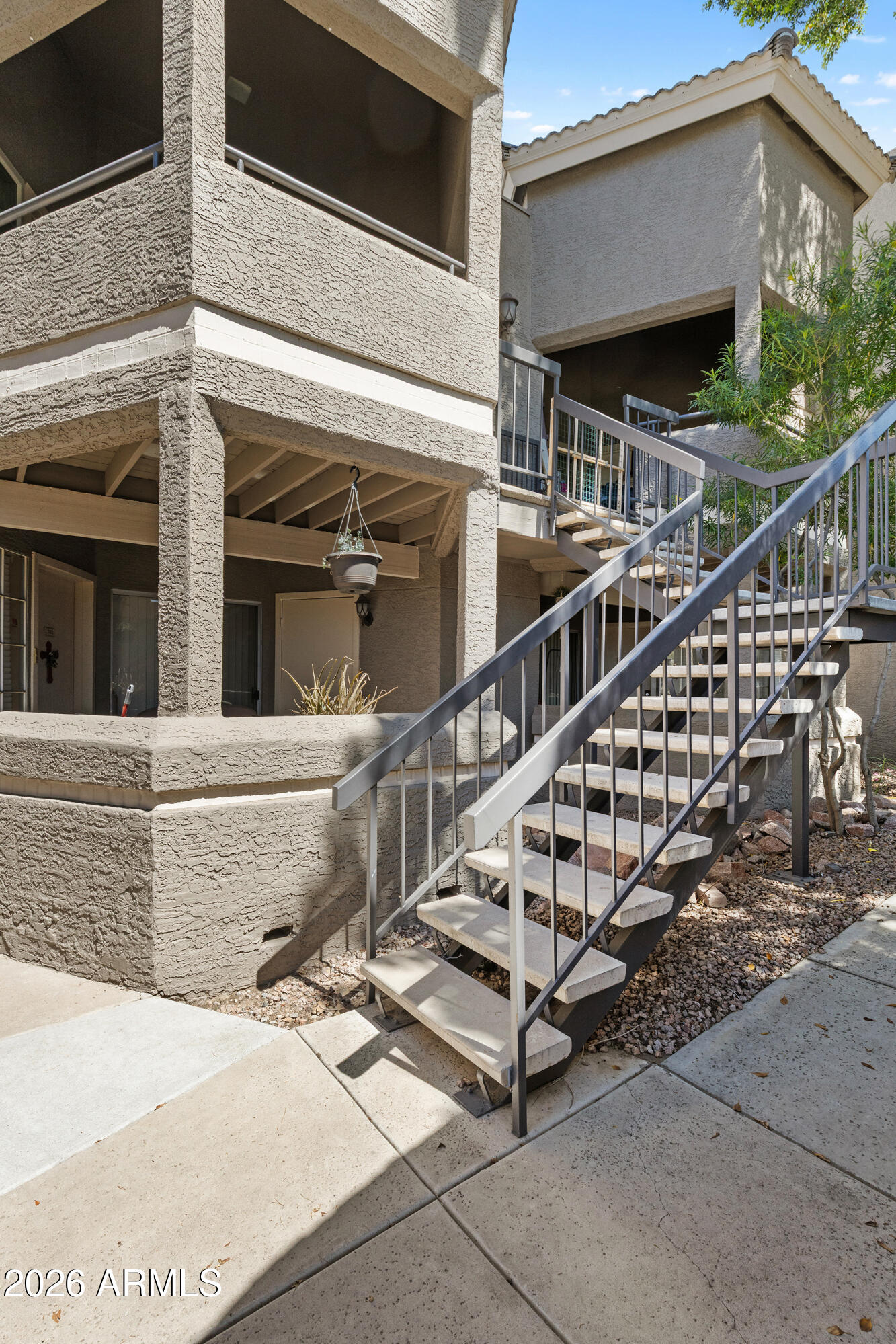 1720 East Thunderbird Road, Unit 2063 Phoenix, AZ 85022 - Photo 2 of 32 a view of a house with pool and wooden fence