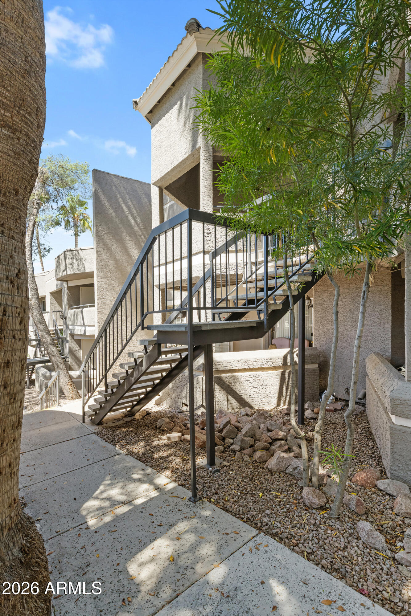 1720 East Thunderbird Road, Unit 2063 Phoenix, AZ 85022 - Photo 6 of 32 a view of a chairs setting on the backyard