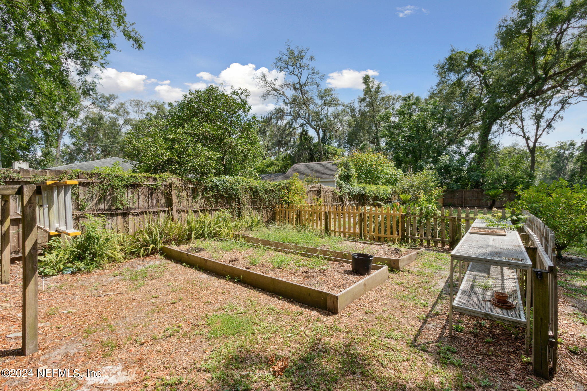 4692 Nottingham Road Jacksonville, FL 32210 - Photo 43 of 63 Planter boxes and potting shelves