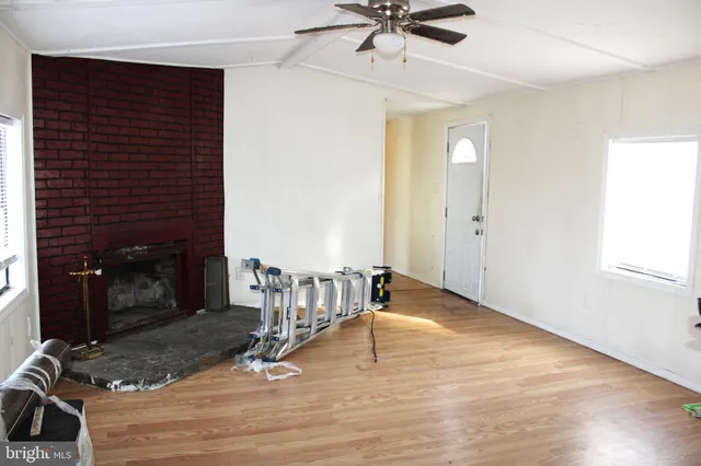 a view of a livingroom with a fireplace