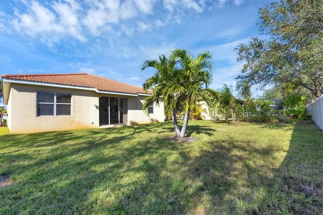 a house view with a garden space