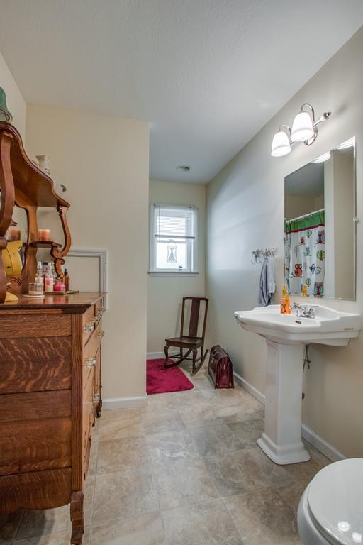 596 Goad Ridge Lane Pleasant Shade, TN 37145 - Photo 12 of 30 a room with a mirror and gym equipment