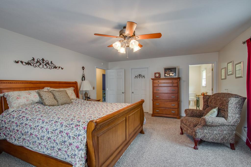 596 Goad Ridge Lane Pleasant Shade, TN 37145 - Photo 14 of 30 a bed room with a bed and furniture
