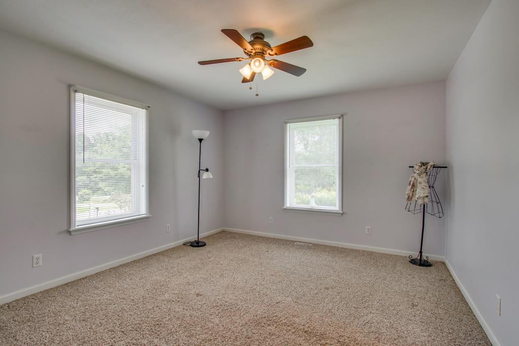 596 Goad Ridge Lane Pleasant Shade, TN 37145 - Photo 19 of 30 a view of an empty room with a window