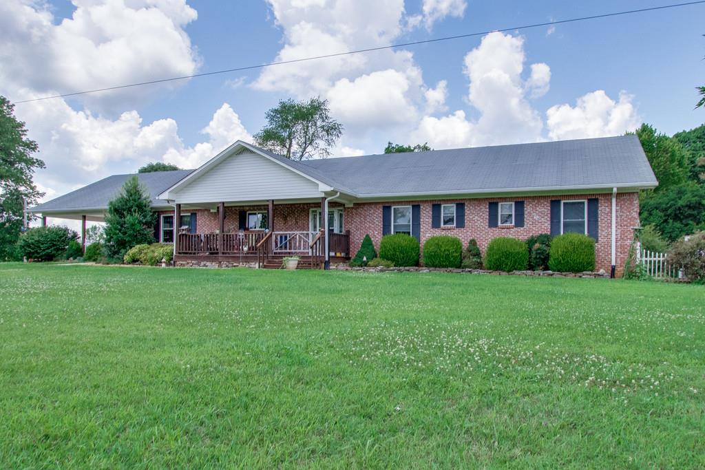 596 Goad Ridge Lane Pleasant Shade, TN 37145 - Photo 3 of 30 a view of a house with a yard