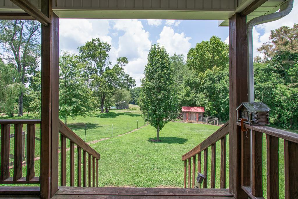 596 Goad Ridge Lane Pleasant Shade, TN 37145 - Photo 24 of 30 a view of a balcony with yard