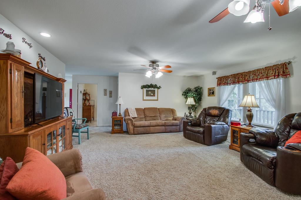 596 Goad Ridge Lane Pleasant Shade, TN 37145 - Photo 4 of 30 a living room with furniture and a flat screen tv