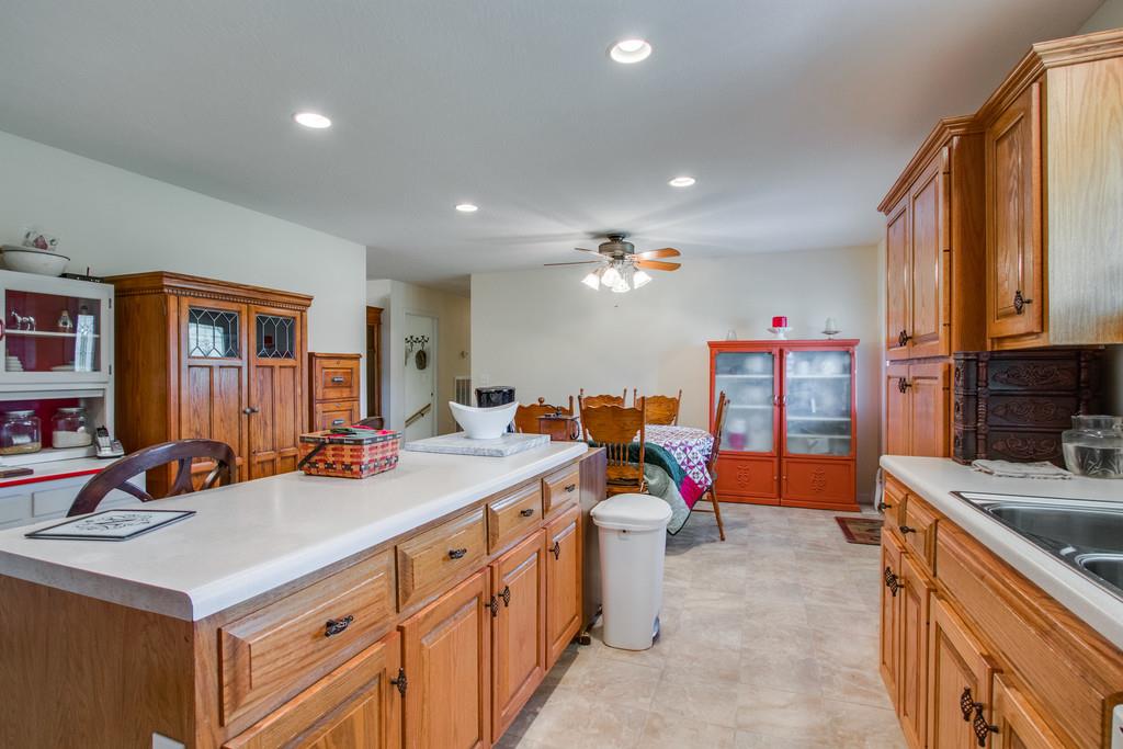 596 Goad Ridge Lane Pleasant Shade, TN 37145 - Photo 8 of 30 a view of a kitchen counter space and breakfast area