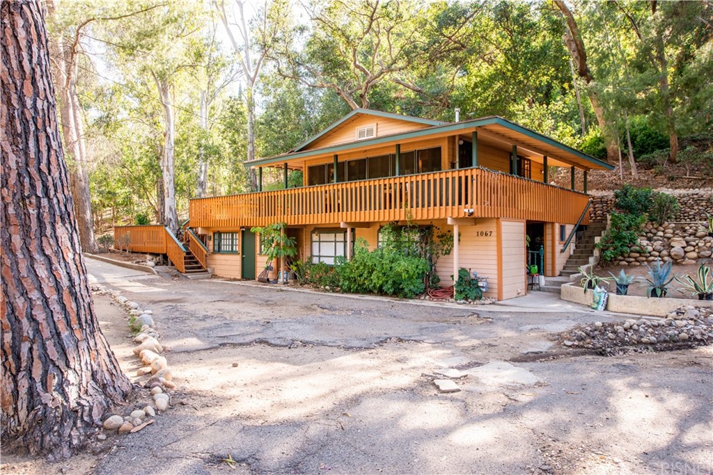 1067 Black Canyon Road Simi Valley, CA 93063 - Photo 1 of 1 a front view of a house with a yard