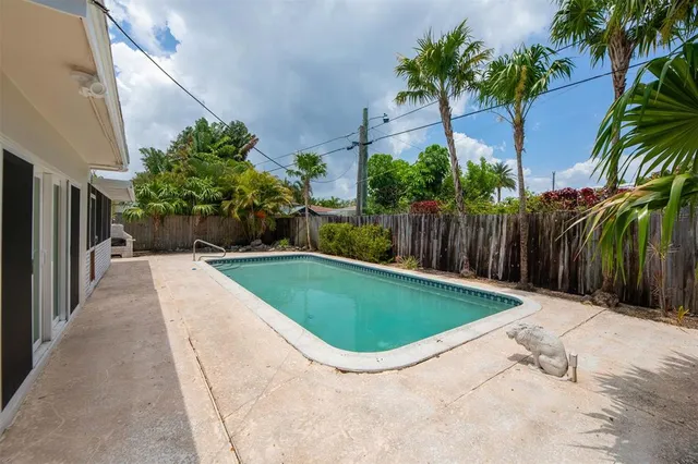a view of outdoor space and swimming pool