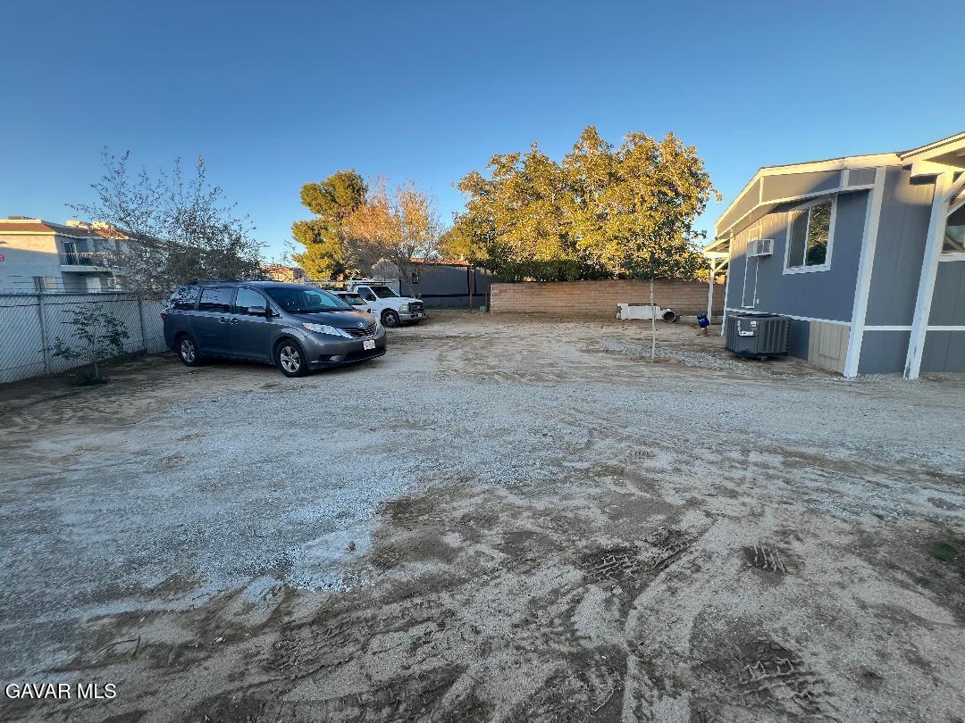 3300 15th Street West, Unit SPC 57 Rosamond, CA 93560 - Photo 23 of 23 a view of a backyard