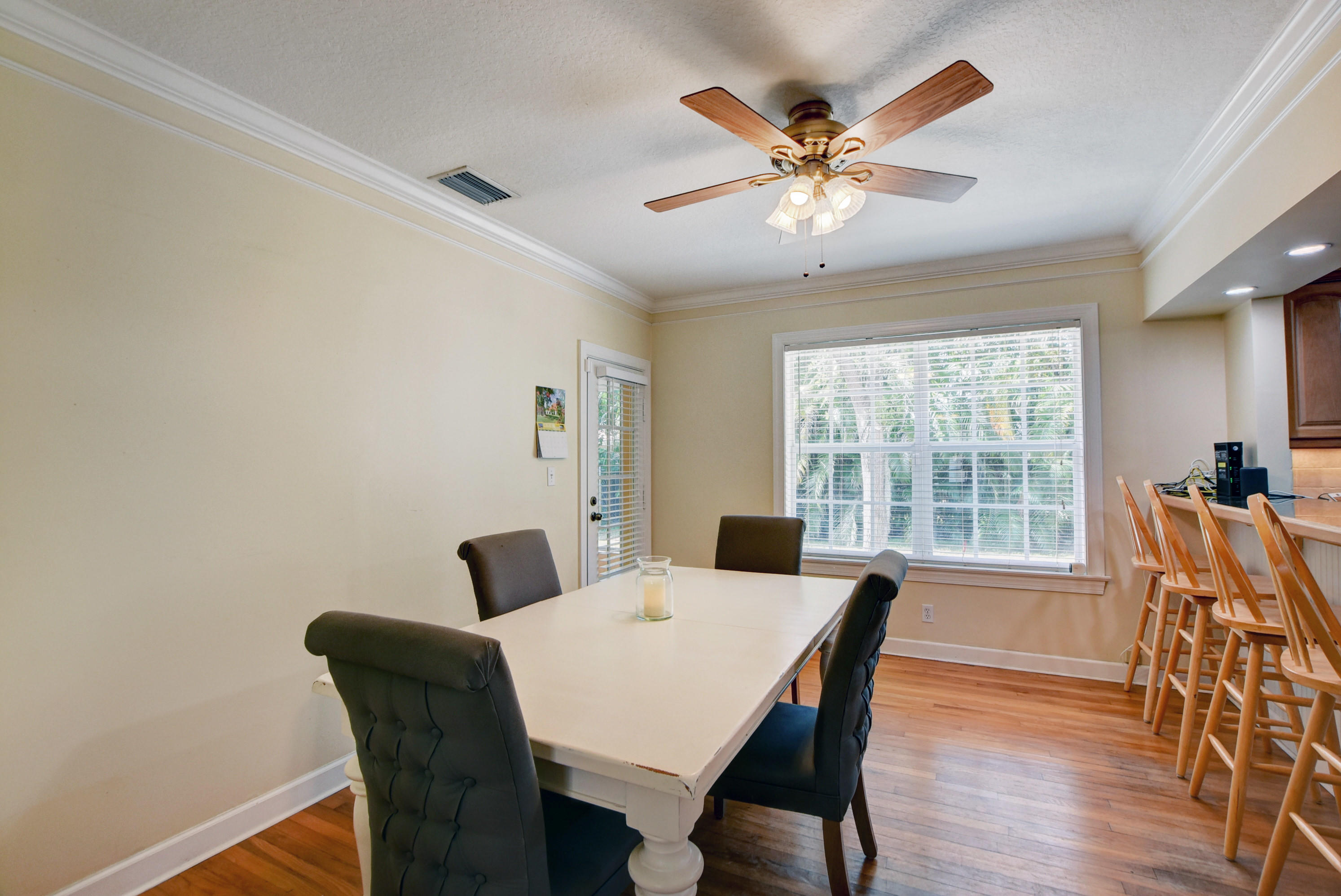 324 Edmor Road West Palm Beach, FL 33405 - Photo 8 of 26 Dining Area with Door to Screened Patio