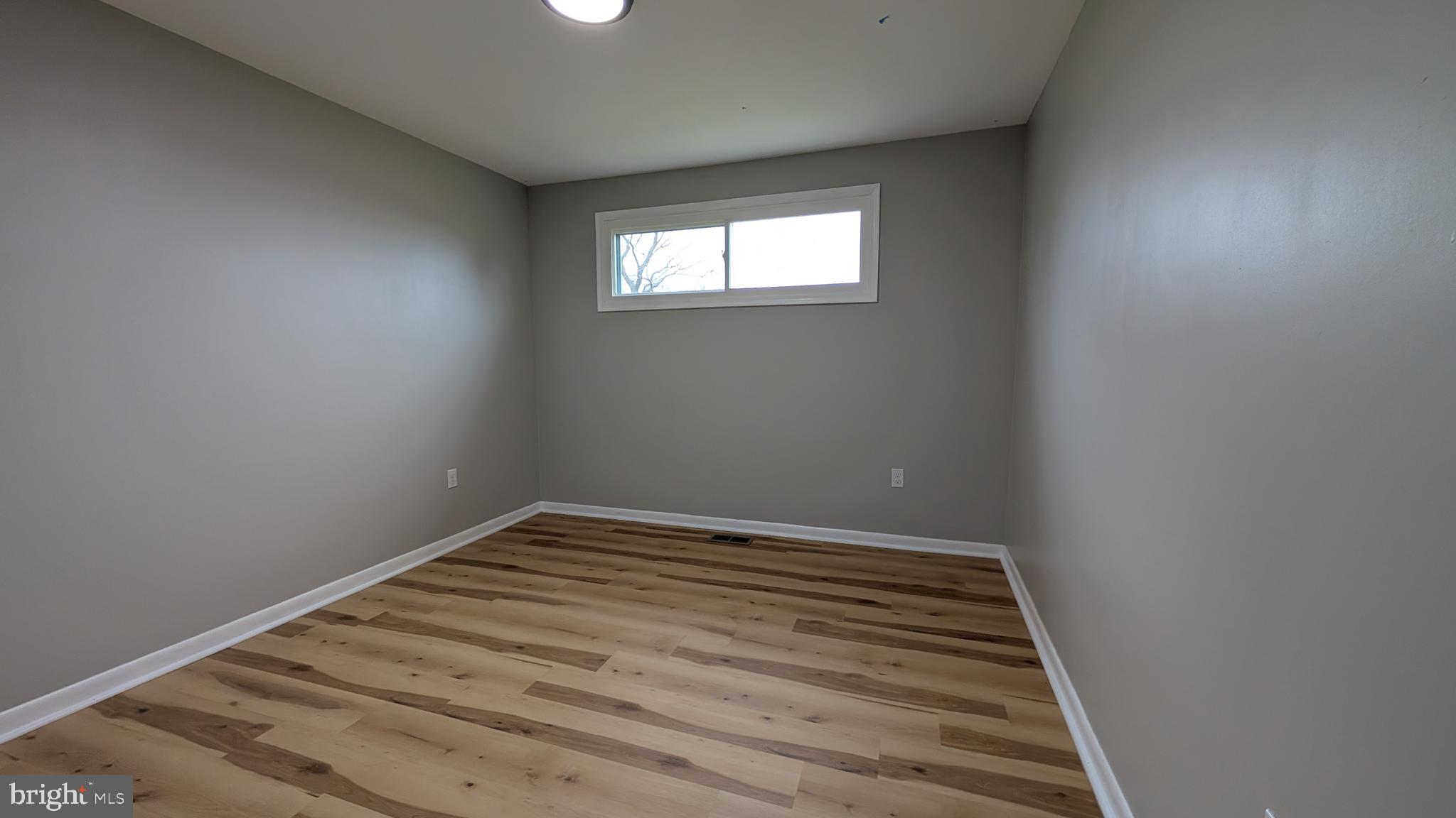 70 Hellers Church Road Leola, PA 17540 - Photo 14 of 25 a view of a room with wooden floor and window
