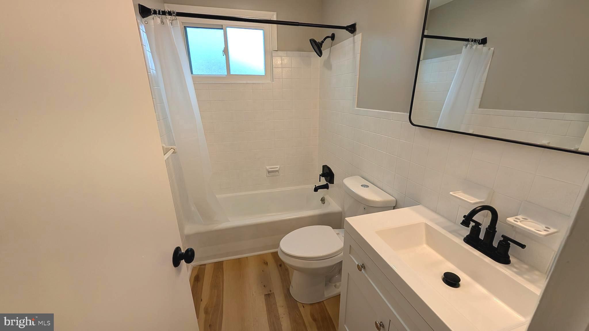 70 Hellers Church Road Leola, PA 17540 - Photo 20 of 25 a bathroom with a sink a toilet and shower