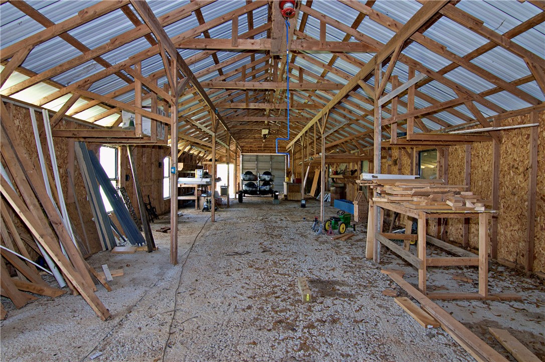 7893 Athens Road Carnesville, GA 30521 - Photo 38 of 50 This spacious barn features ample room and a durable gravel floor, ideal for storage or workshop use.