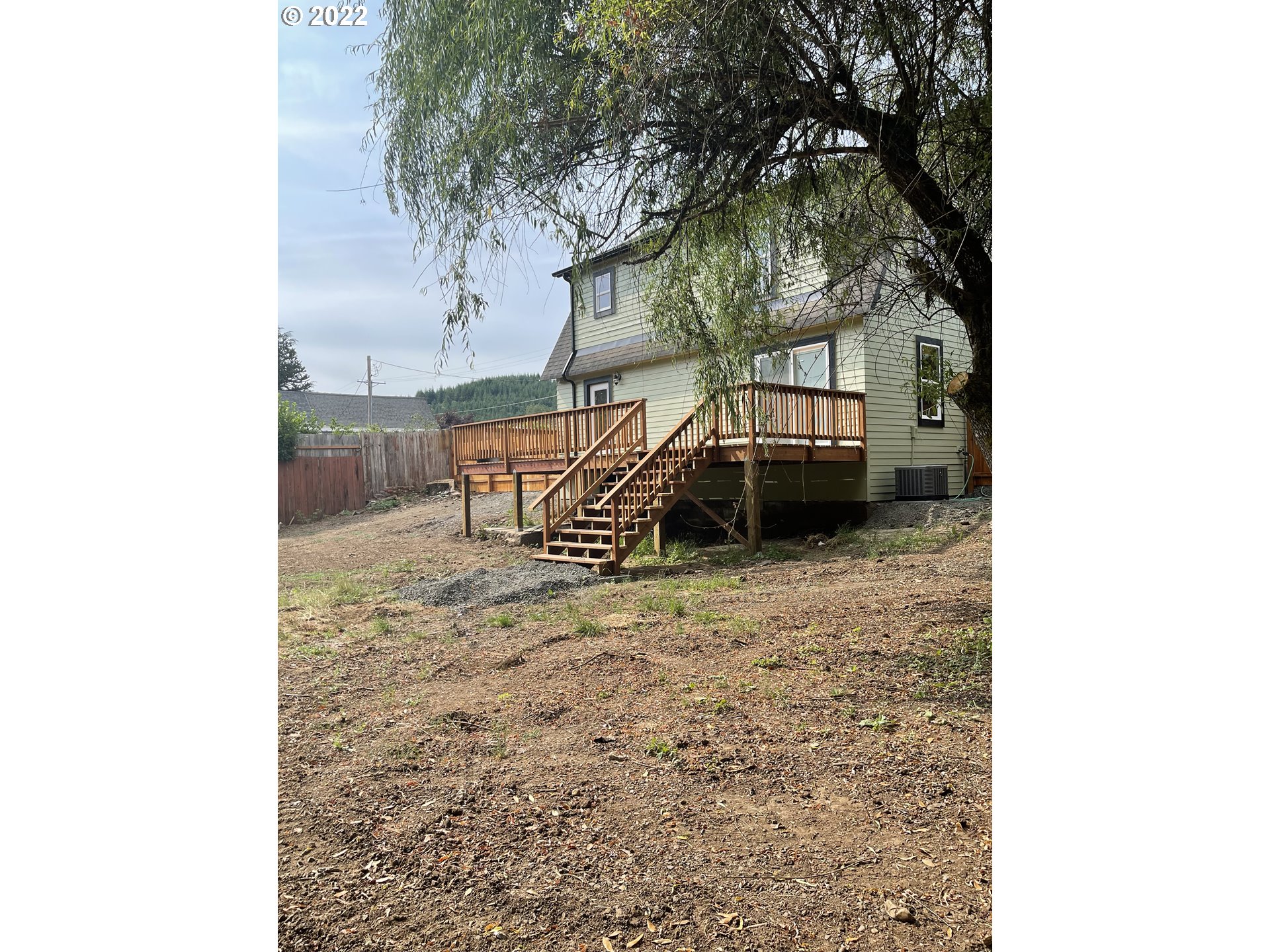 92175 Marcola Road Marcola, OR 97454 - Photo 3 of 26 a backyard of a house with table and chairs