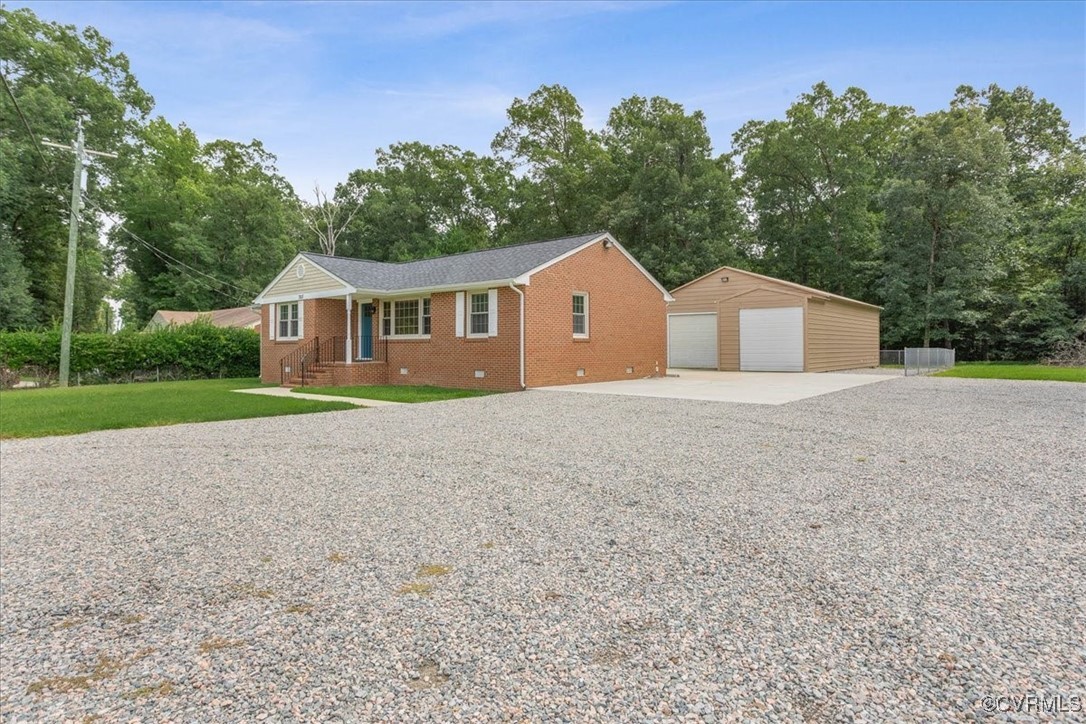 7513 River Road Petersburg, VA 23803 - Photo 2 of 30 Ranch-style home with a garage, brick siding, an o