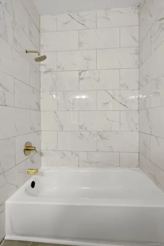 a bathroom with a bathtub