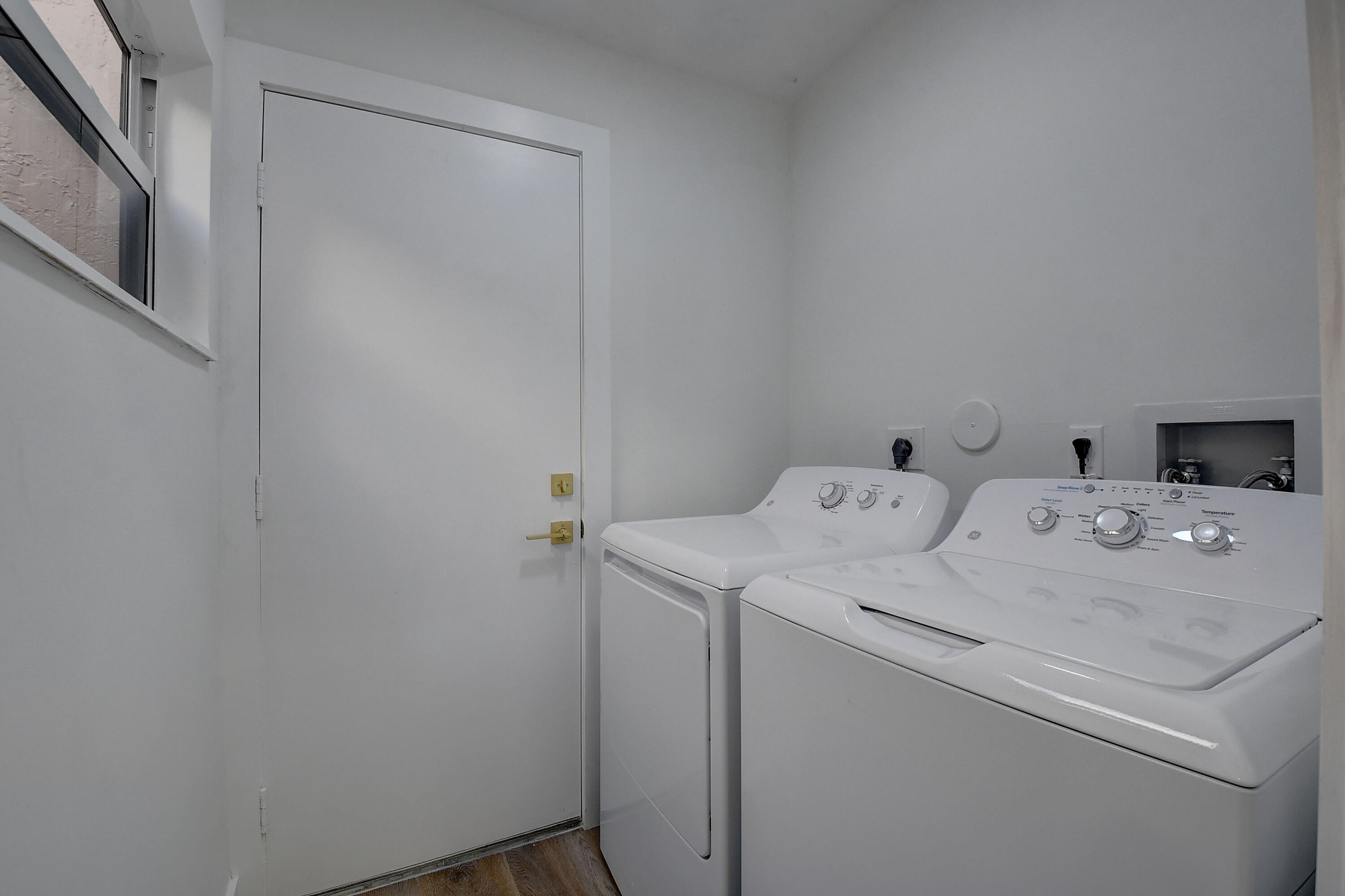 8204 Summerbreeze Lane Boca Raton, FL 33496 - Photo 17 of 47 a utility room with dryer and washer
