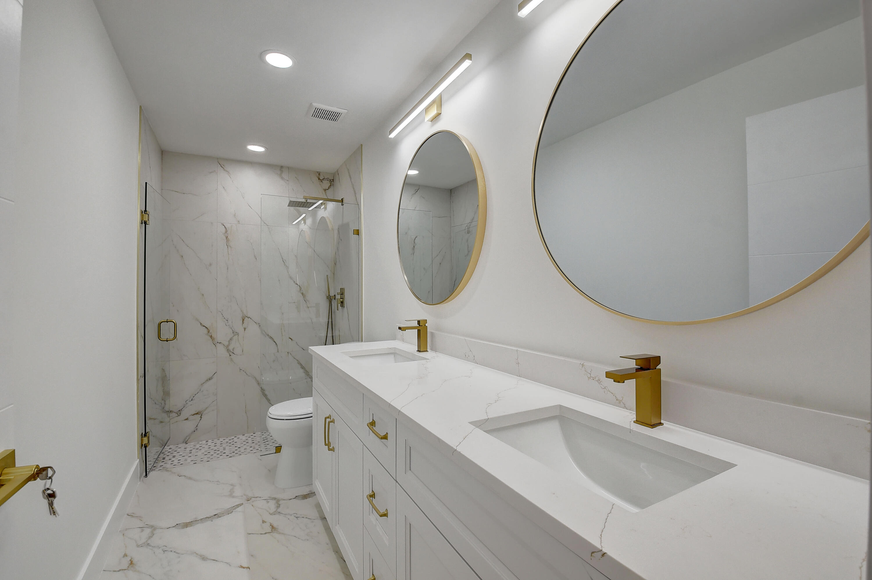 8204 Summerbreeze Lane Boca Raton, FL 33496 - Photo 21 of 47 a bathroom with a sink and a mirror