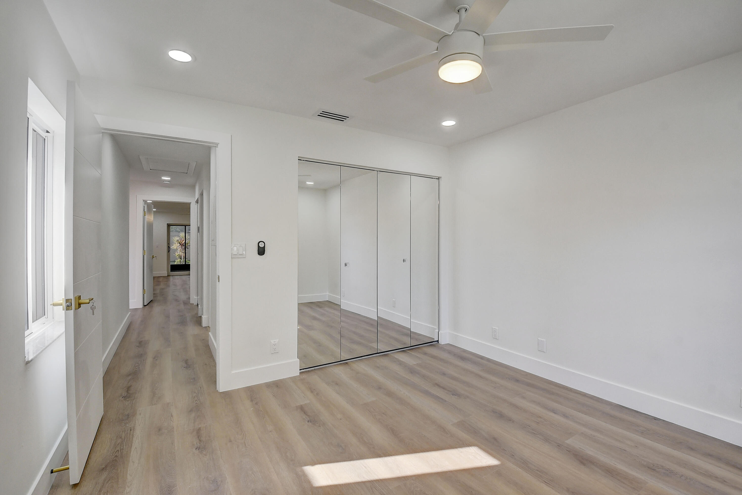 8204 Summerbreeze Lane Boca Raton, FL 33496 - Photo 24 of 47 wooden floor in an empty room with wooden floor