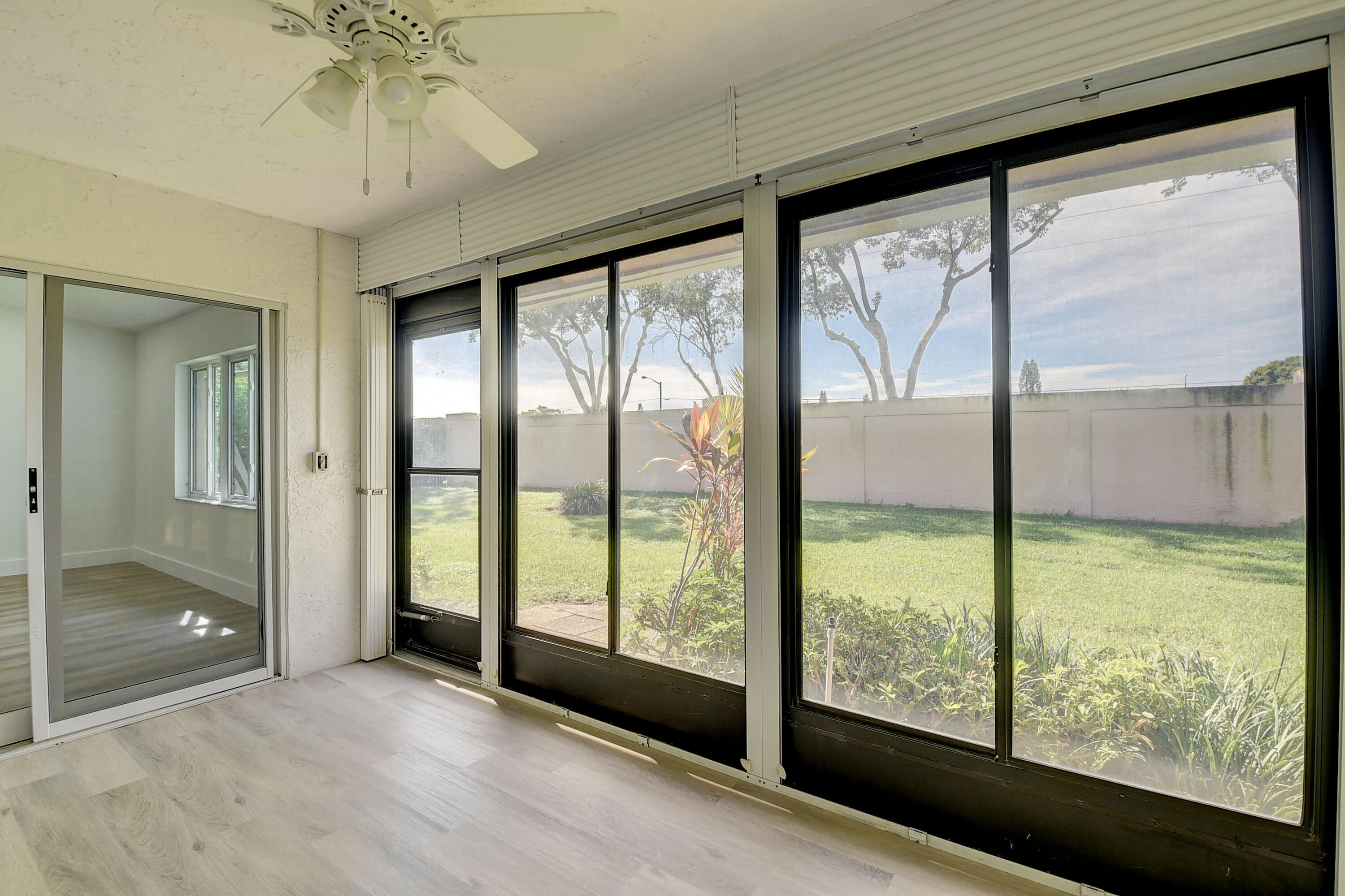 8204 Summerbreeze Lane Boca Raton, FL 33496 - Photo 29 of 47 a view of an empty room with a window