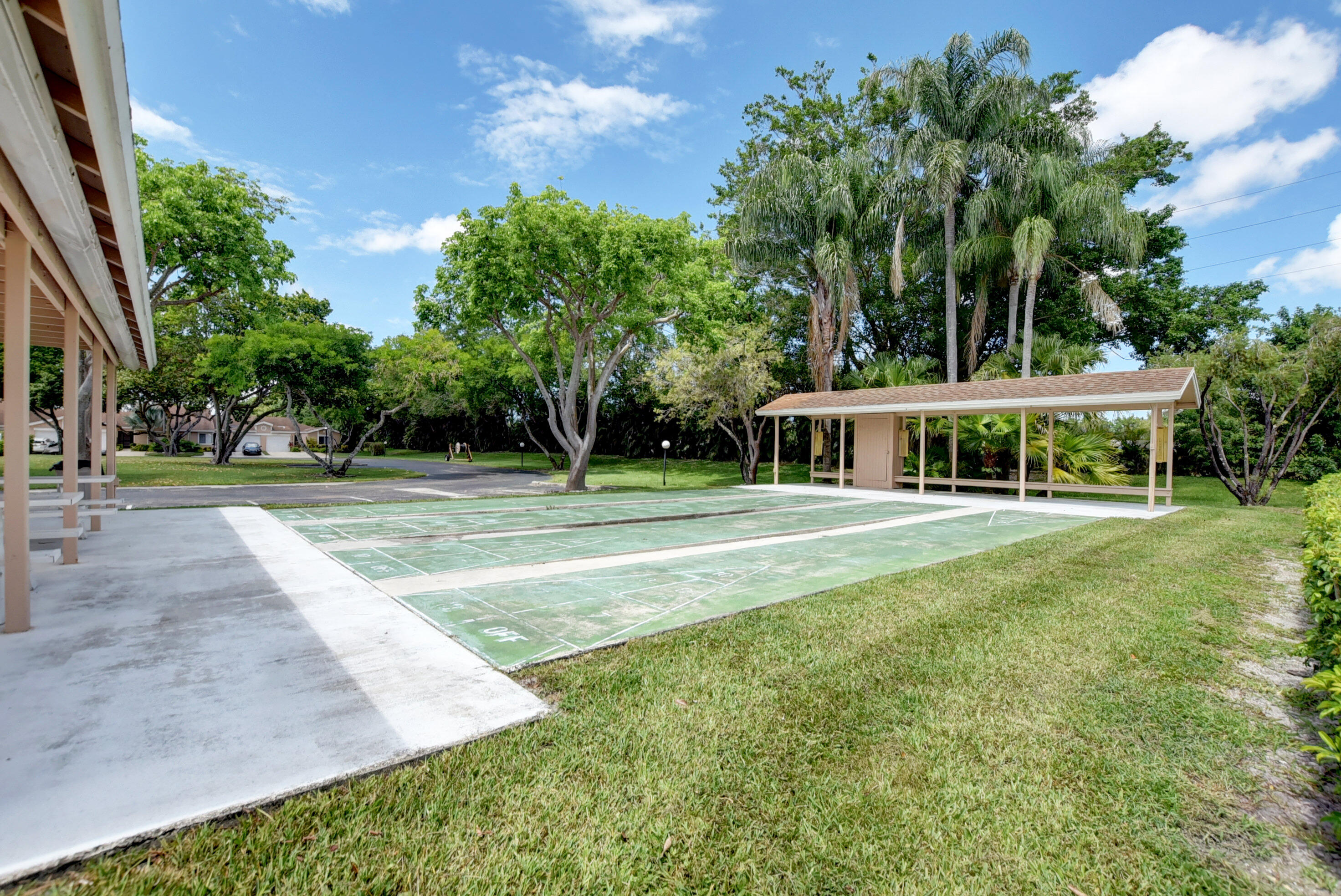 8204 Summerbreeze Lane Boca Raton, FL 33496 - Photo 47 of 47 a front view of a house with a garden