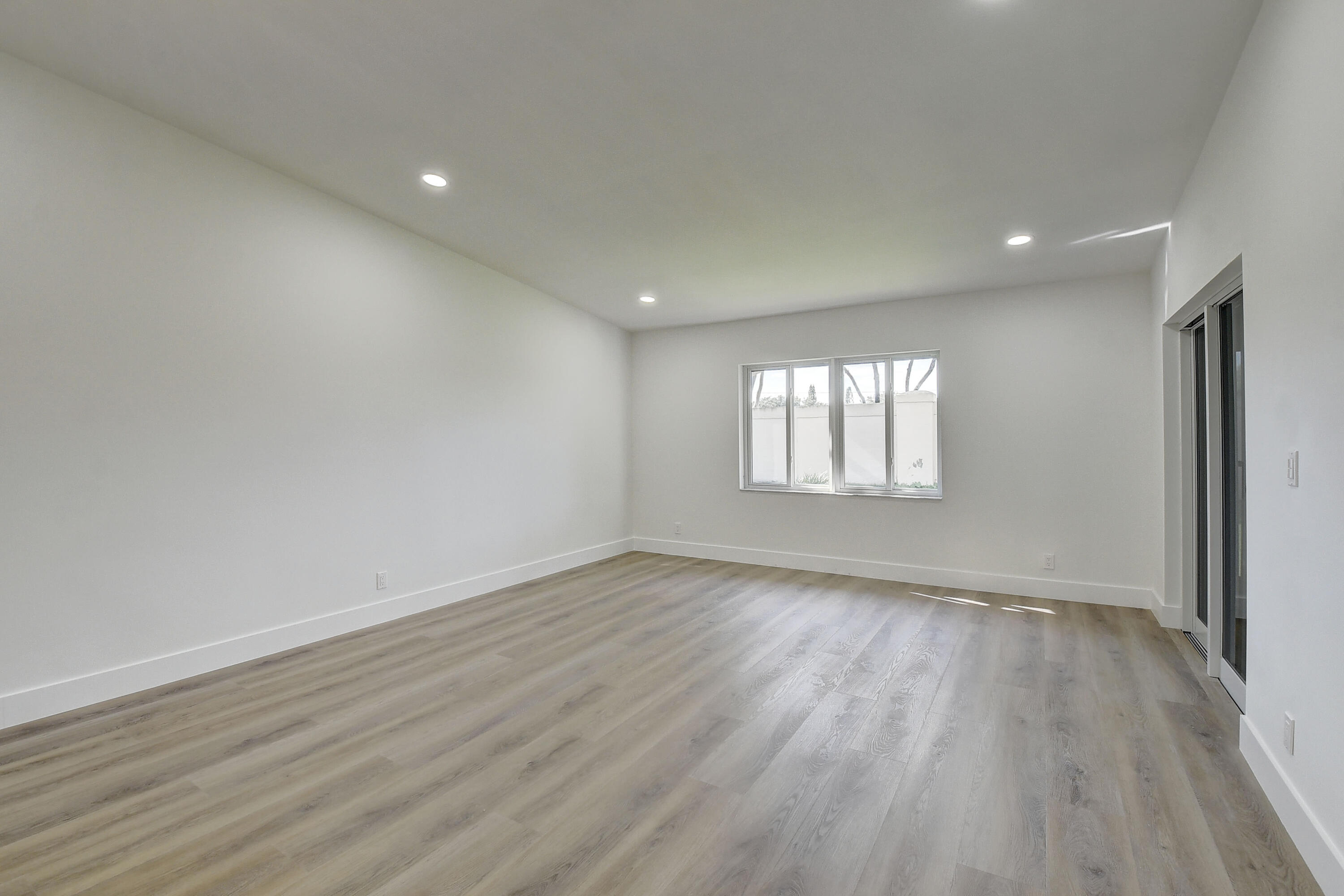 8204 Summerbreeze Lane Boca Raton, FL 33496 - Photo 9 of 47 a view of an empty room and a window
