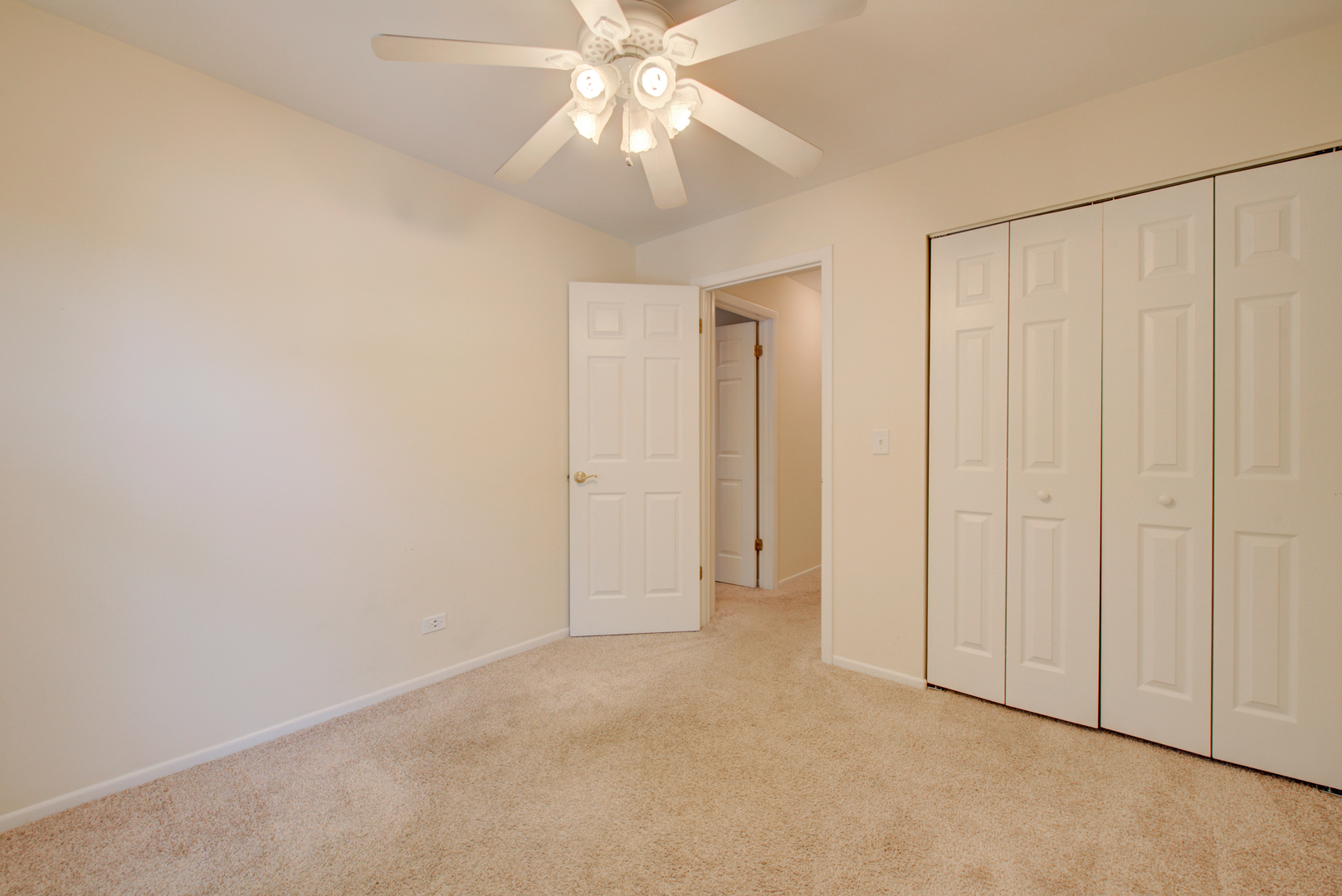 2710 Northampton Drive, Unit C2 Rolling Meadows, IL 60008 - Photo 15 of 19 an empty room with fan