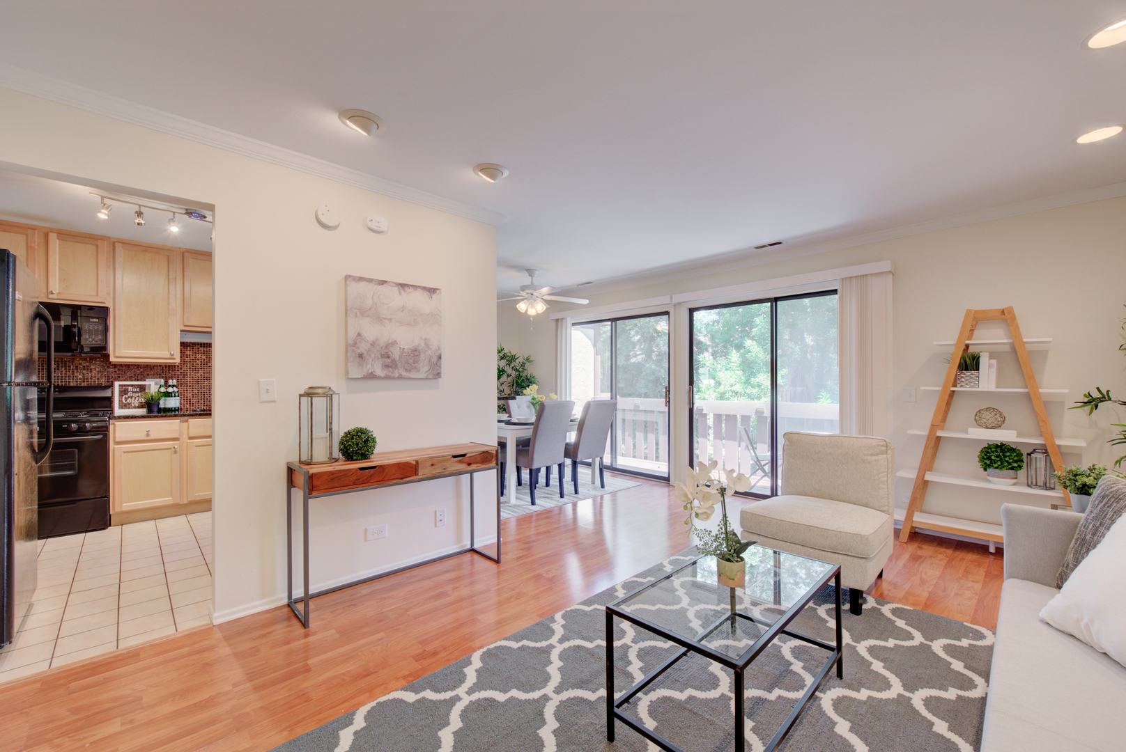 2710 Northampton Drive, Unit C2 Rolling Meadows, IL 60008 - Photo 3 of 19 a living room with furniture and a wooden floor