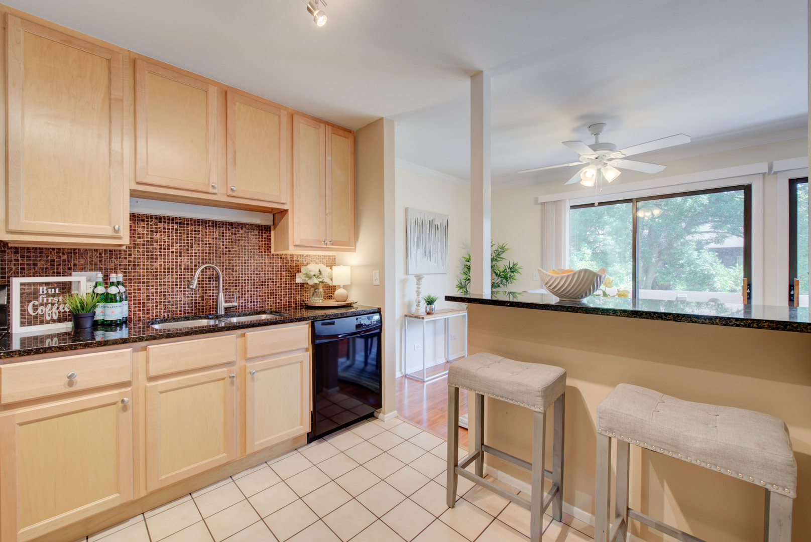 2710 Northampton Drive, Unit C2 Rolling Meadows, IL 60008 - Photo 9 of 19 a kitchen with white cabinets and white appliances