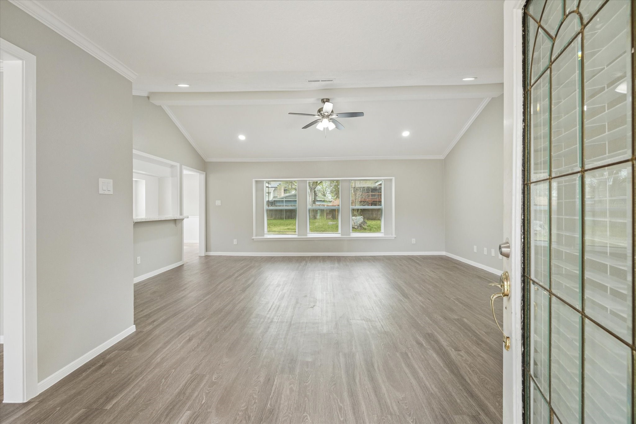 23834 English Oak Drive Spring, TX 77373 - Photo 5 of 11 wooden floor in an empty room with a window