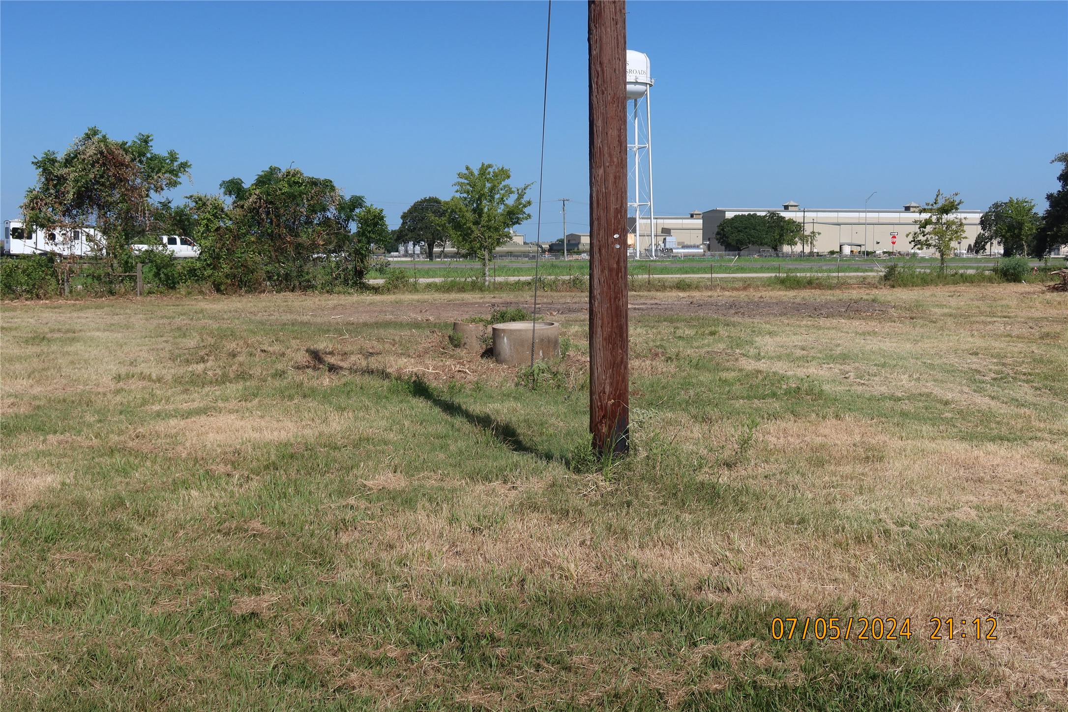 1046 Railhead Road Columbus, TX 78934 - Photo 12 of 24 a view of a road with a yard