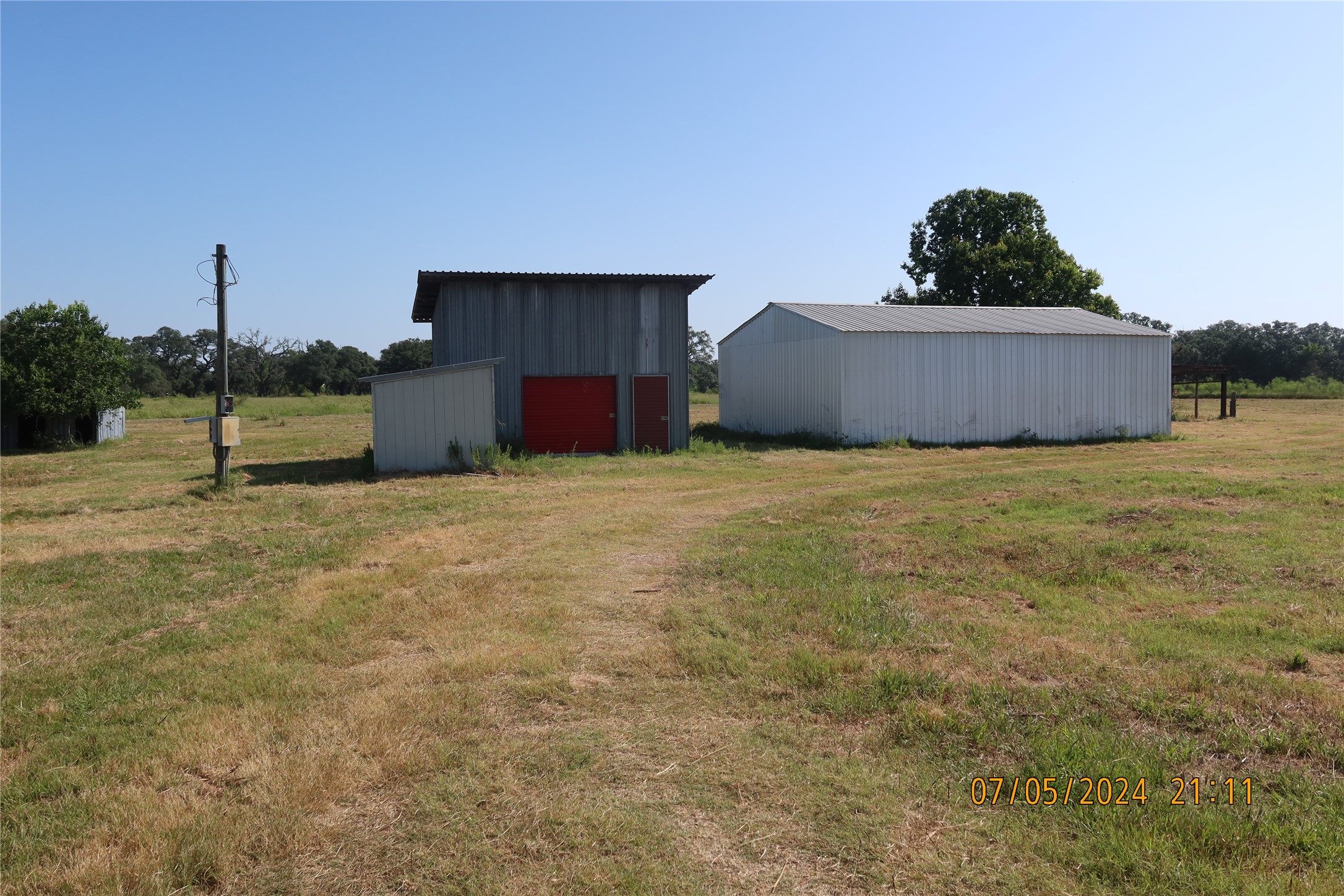 1046 Railhead Road Columbus, TX 78934 - Photo 10 of 24 a view of an outdoor space and kitchen