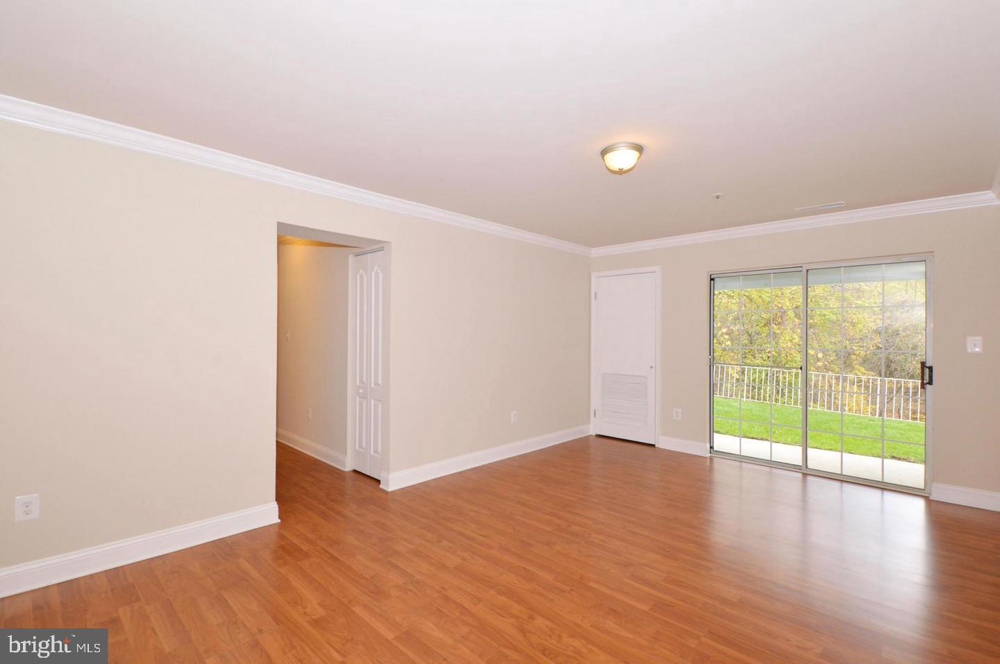 8613 Falls Run Road, Unit B Ellicott City, MD 21043 - Photo 9 of 25 Living room with access to private patio