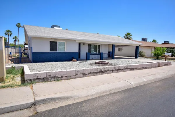 a view of a house with a patio